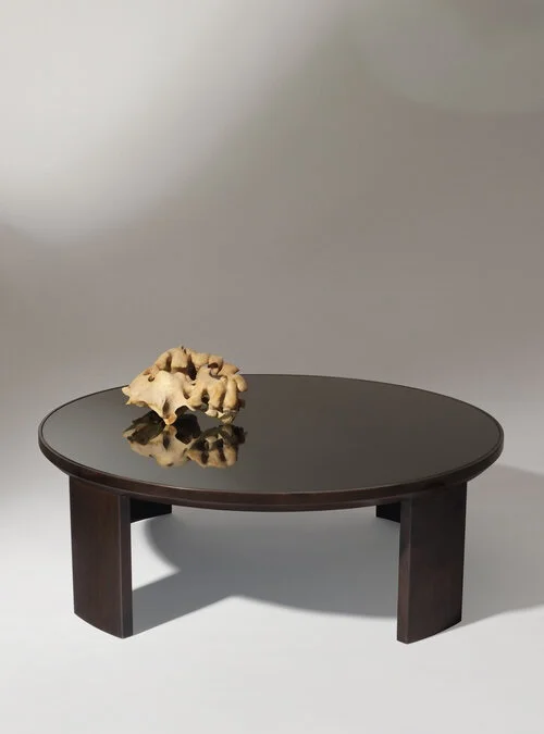 Small round coffee table.