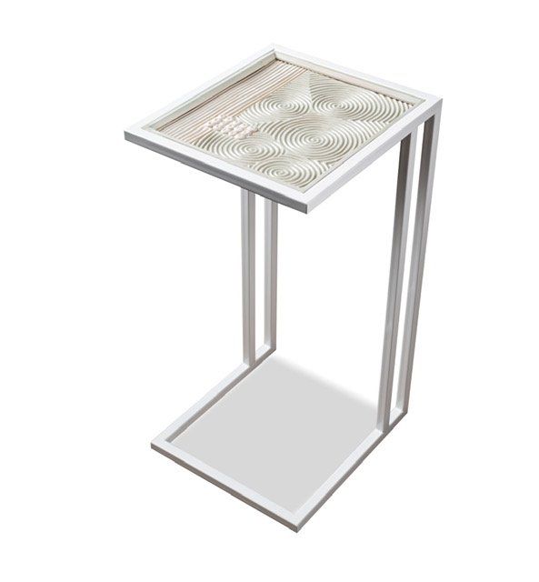 Side table with swirled surface.