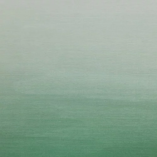 Closeup of woven fabric with ombre color effect.