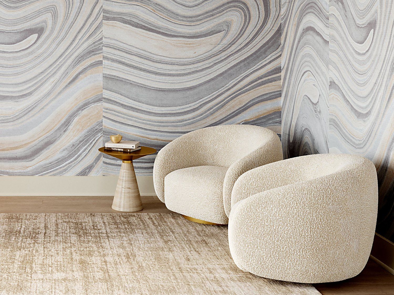 Two curved armchairs in a corner with a backdrop of amorphous wavy graphics on walls.