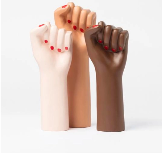 Three vases in three different skin tones. Each is shaped like a woman's hand, wrist and forearmed. The "nails" are polished red.