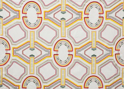 Close up of fabric with intersecting medallions.