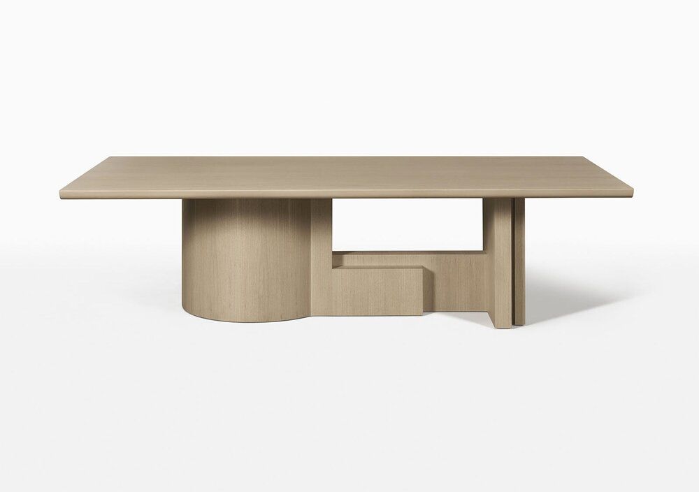 Modern table with barrel pedestal under left side and set of interlocking boards to right side support.