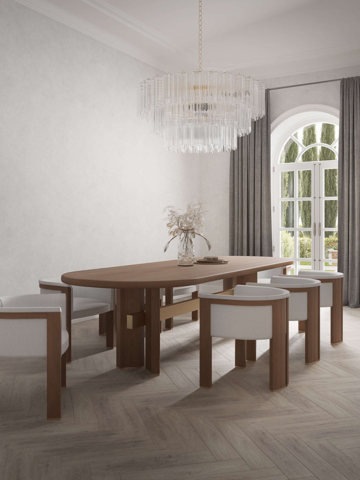 Modern formal dining room with long curved edged wooden table, upholstered chairs and modern glass chandelier.