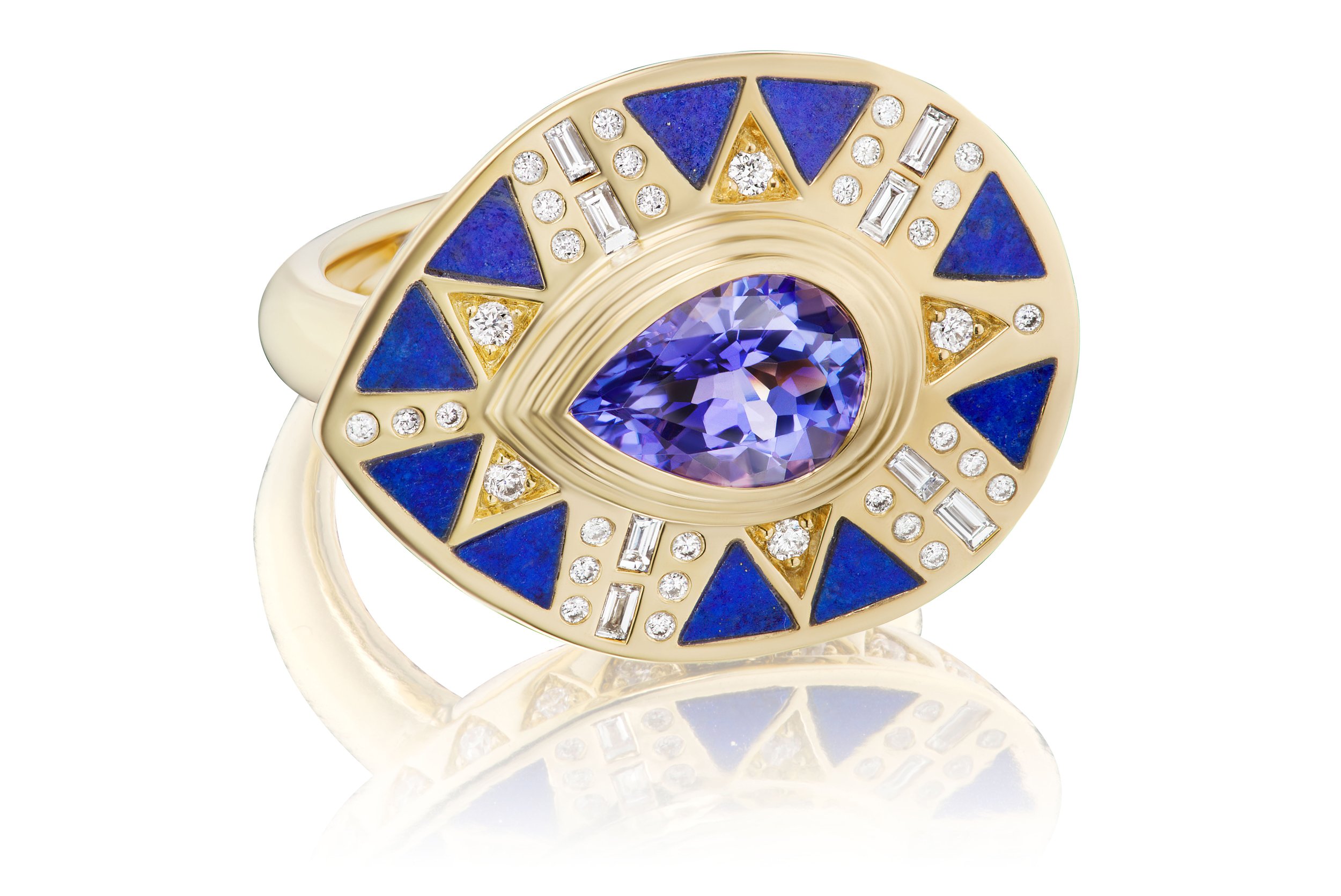 Gold ring with inset blue stones, diamonds and center deep purple teardrop shaped stone in gold design.