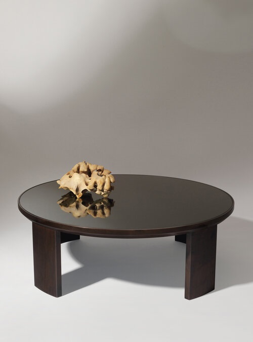 Small round coffee table.