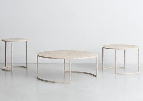 Three round tables in different sizes.