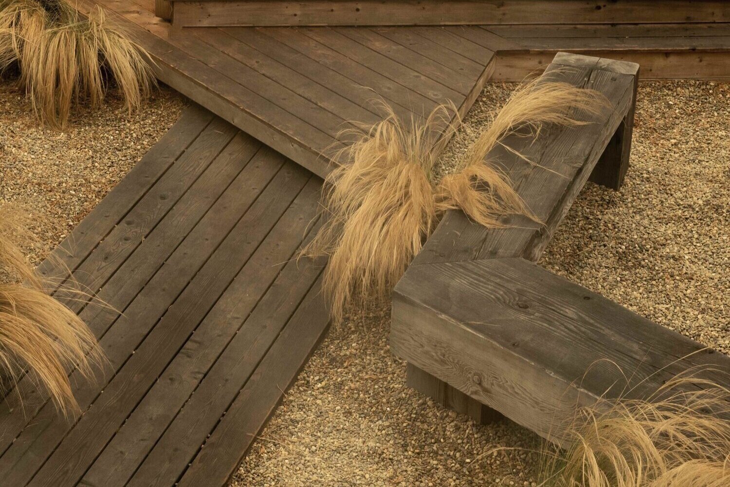 Intersecting layers of deck with long grasses as accents.