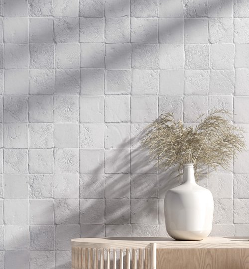 Stacked square stone graphic wall.