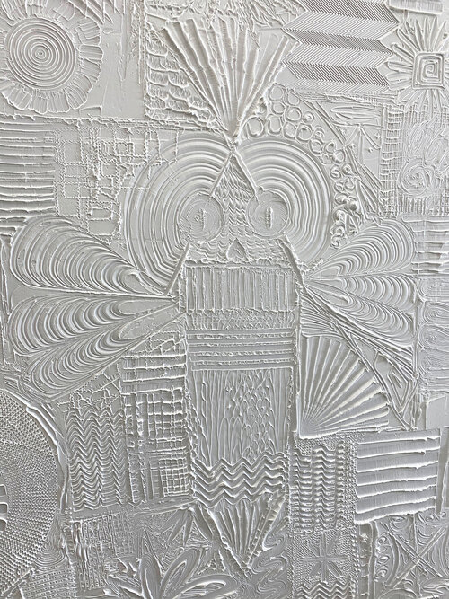 Stylized design created in plaster.