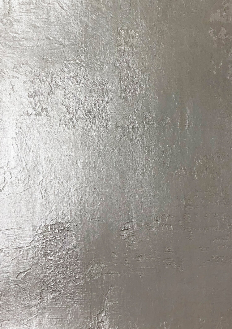 Shiny concrete looking wallcover.