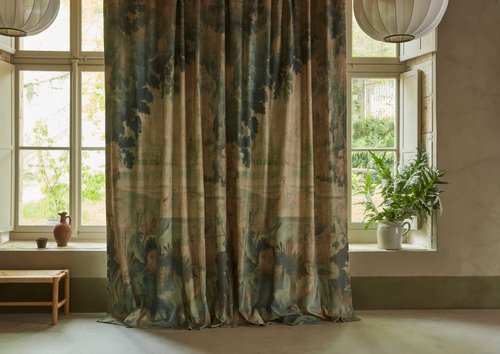 Formal drapes in a modern room.