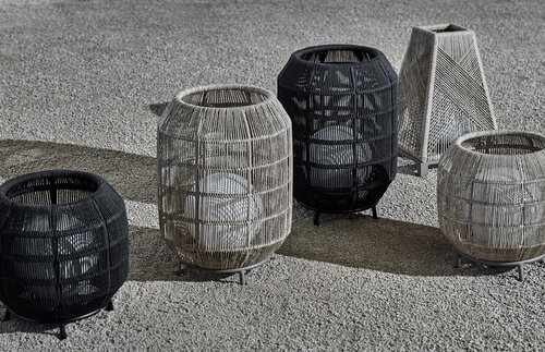 A collection of small lamps shaped like baskets in different shapes and colors.