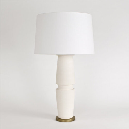 White lamp with white drum shade.