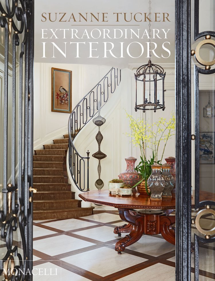 Cover with photo of spectacular home entryway with a curved staircase, title and author.