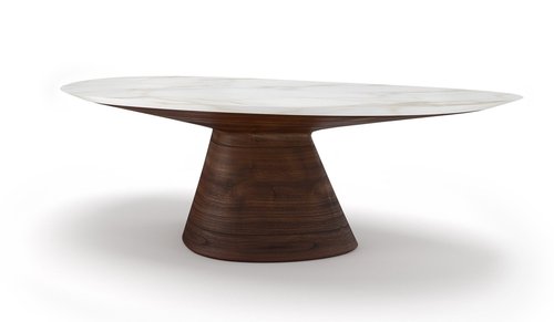 Oblong table top with off-center pedestal.