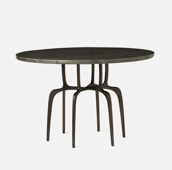 Round table with interlocking six metal legs.