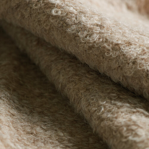 Close up of soft looking knitted fabric.