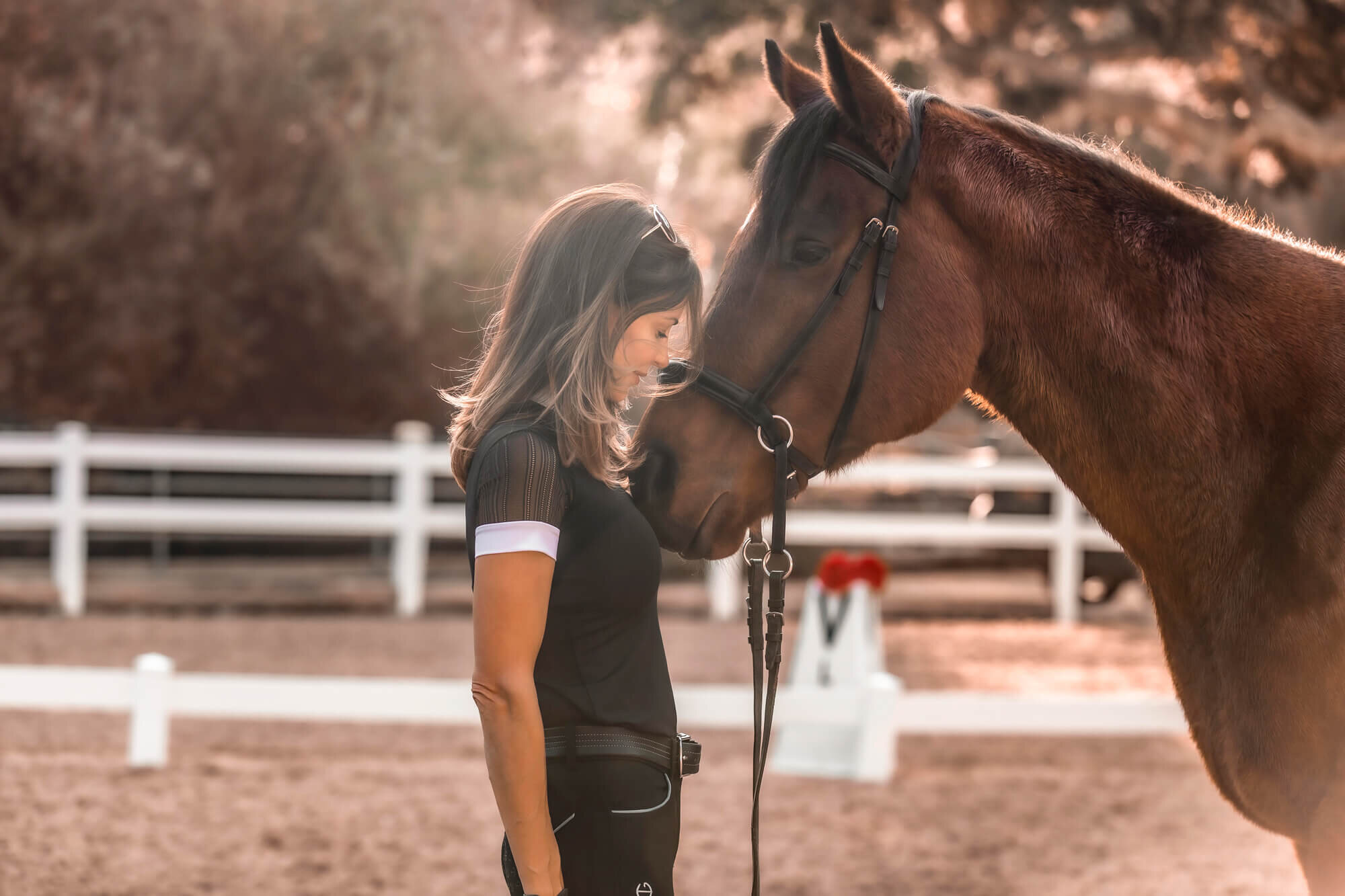 Designer nose-to-nose with her horse.